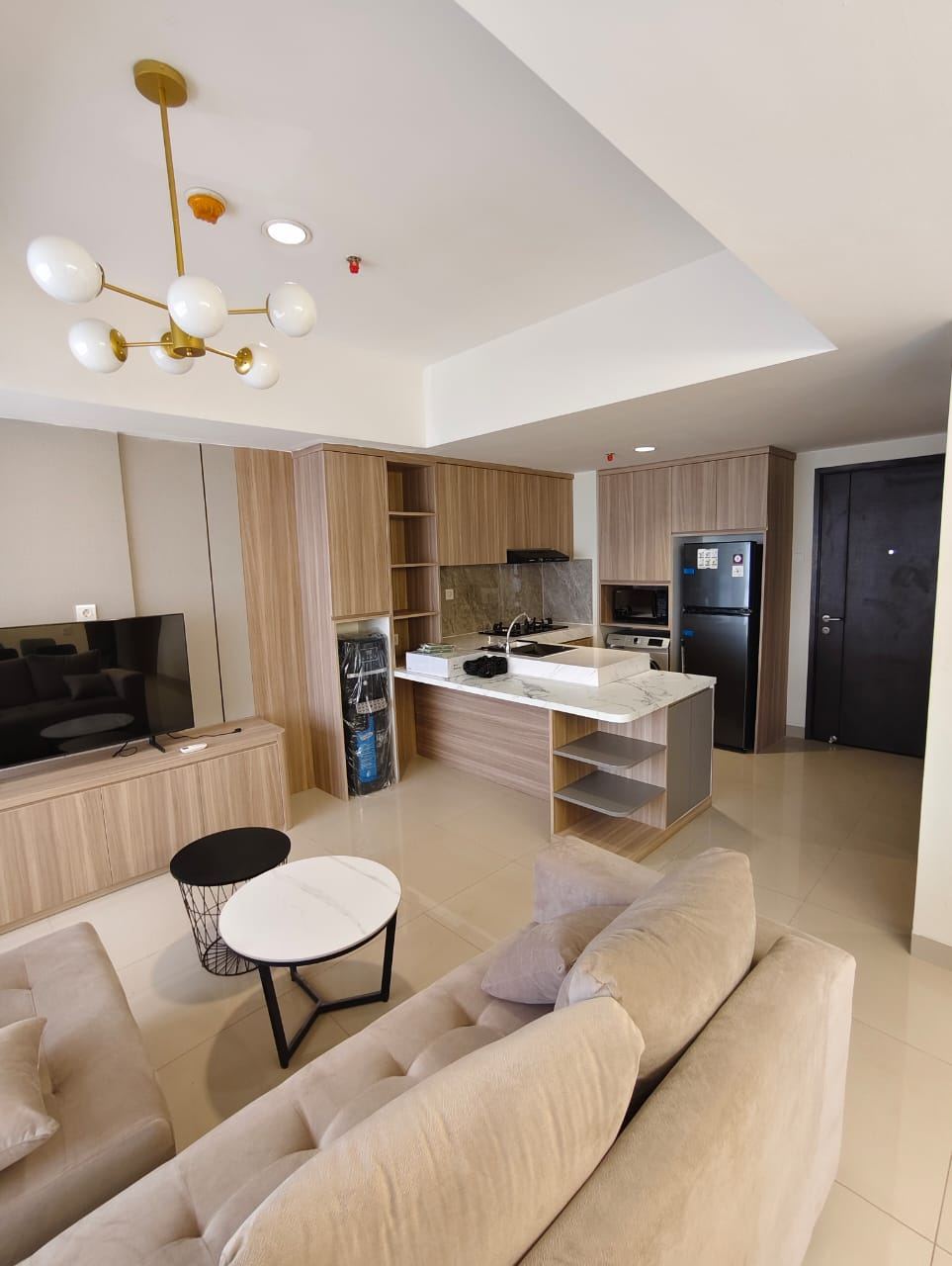 Di sewakan apartemen new furnished orange county cikarang